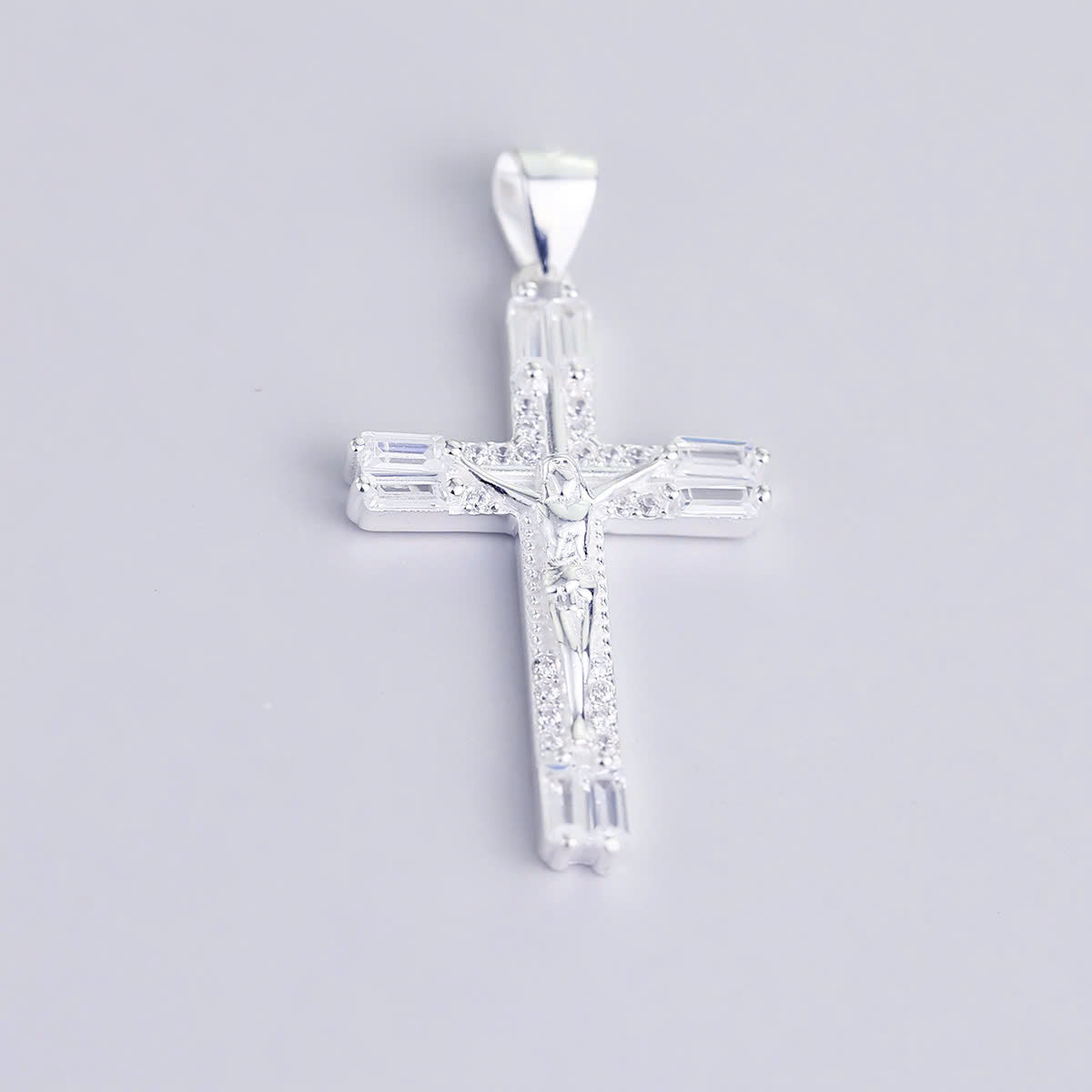 JUELHAUS S990 Pure Silver Cross Pendant With Luxurious 4-Headed Baguette Stone Jesus Statue