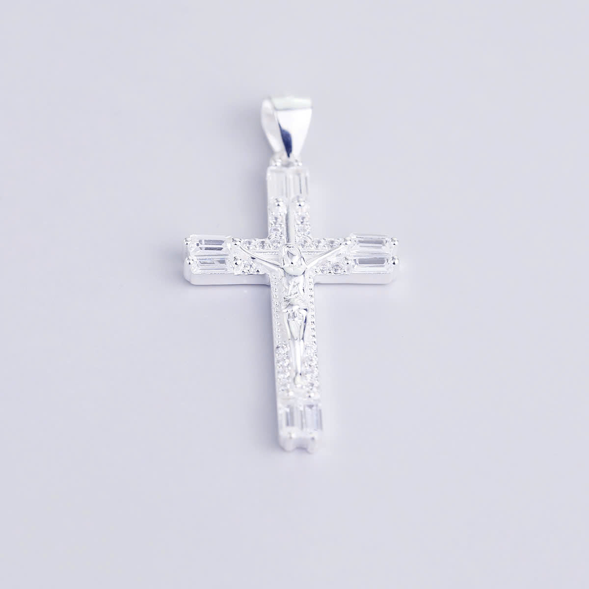 JUELHAUS S990 Pure Silver Cross Pendant With Luxurious 4-Headed Baguette Stone Jesus Statue